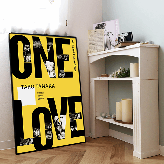 壁に立てかけているOneLoveのエコー写真ポスター