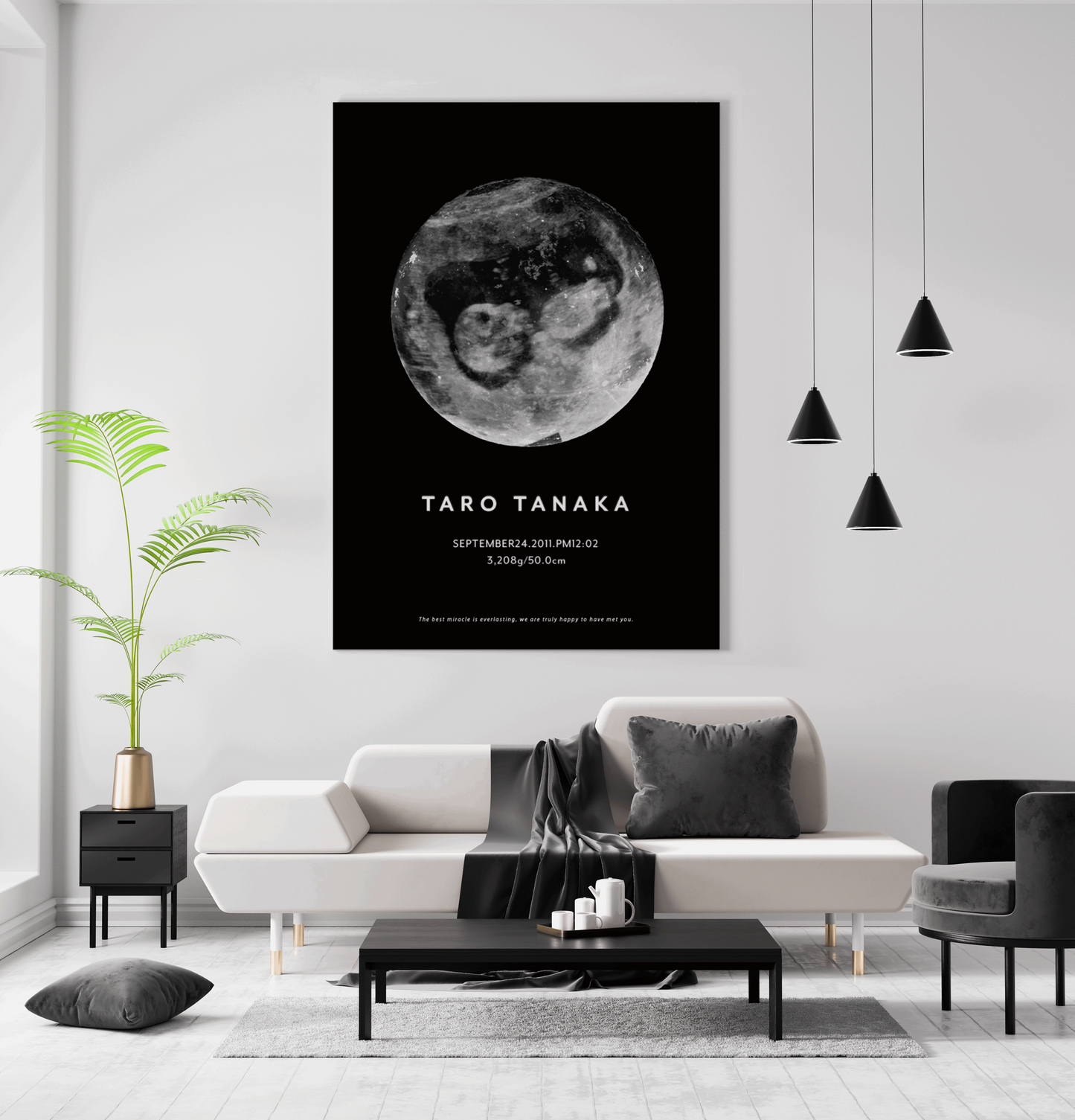 壁に飾ったMoonのデザインのエコー写真を使って作ったポスター。